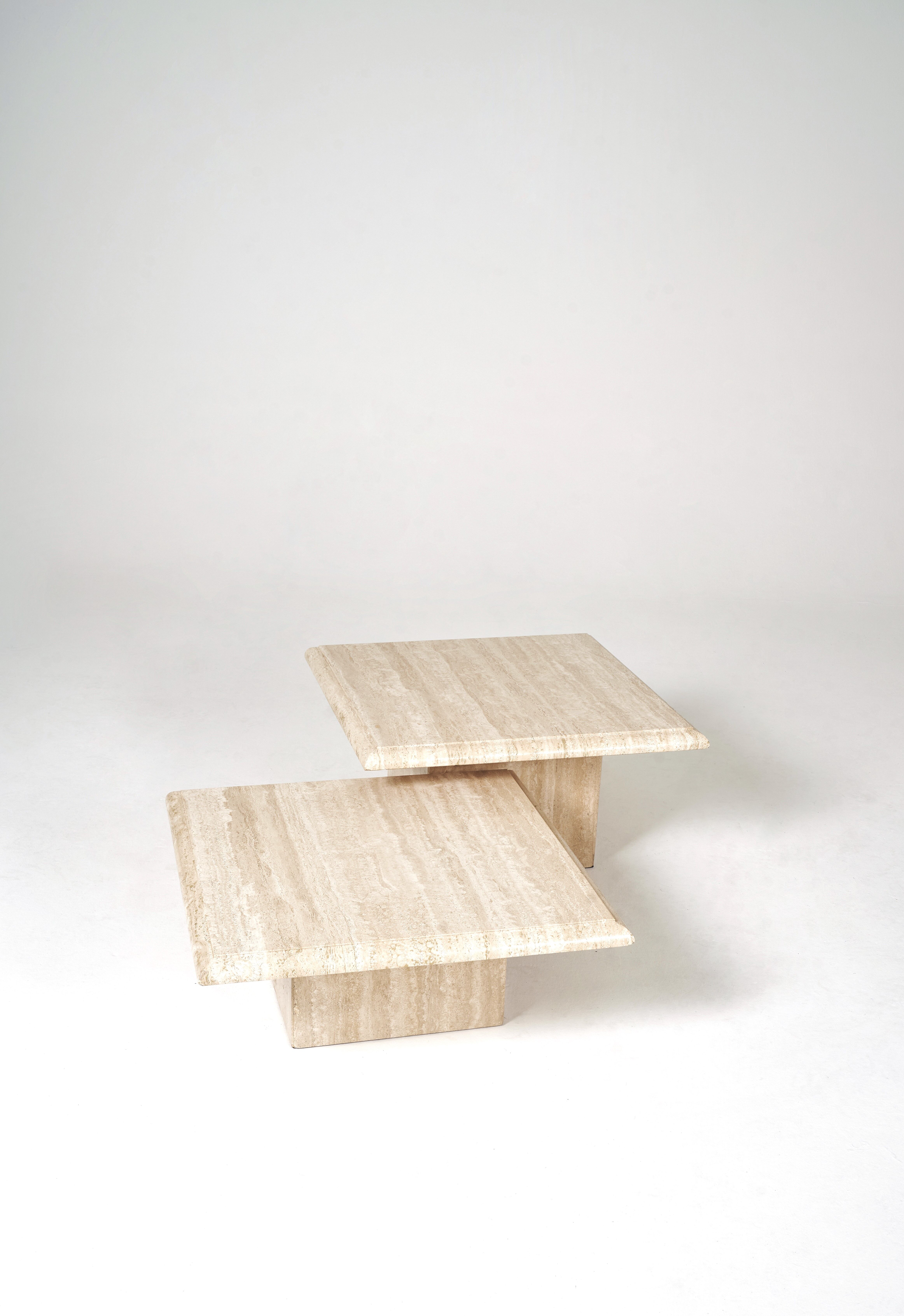 2 travertine coffee tables trundles