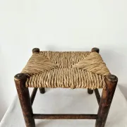 Small rustic vintage wooden and straw stool -