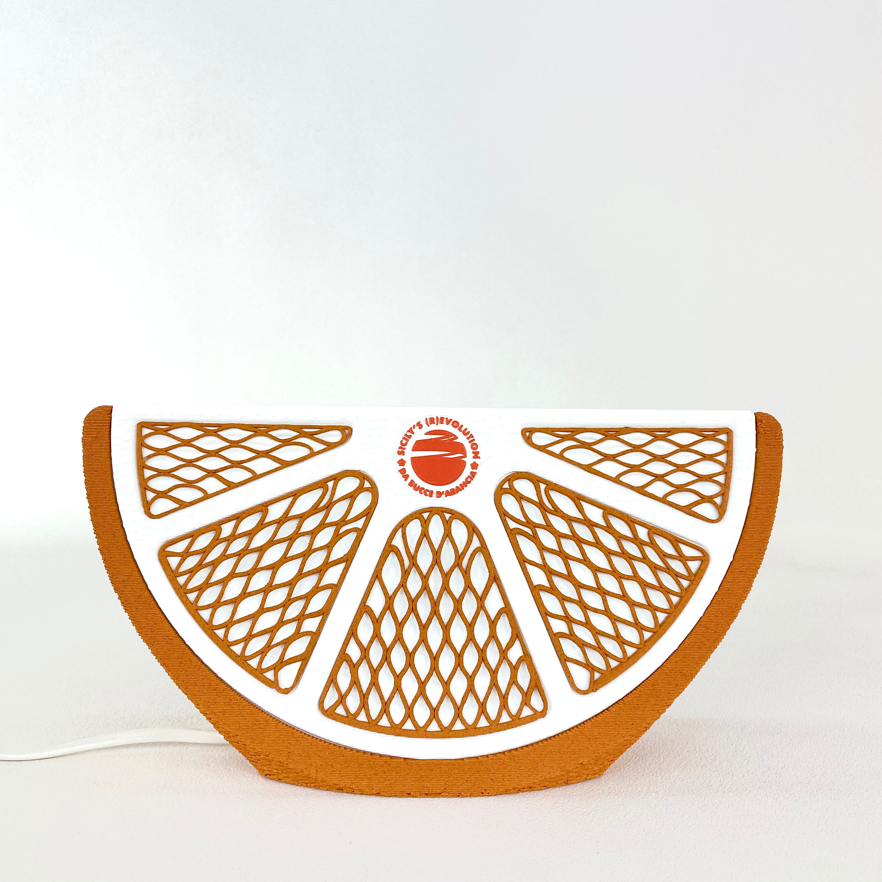 Orange quarter table lamp Seletti and Sanpellegrino