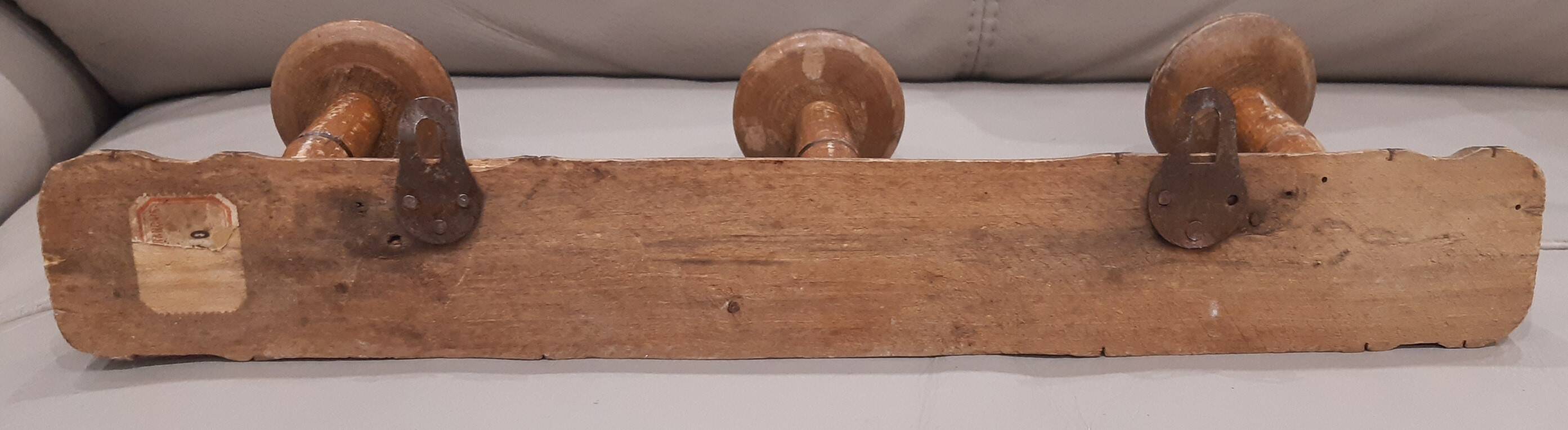 Wall-mounted coat rack in antique wood