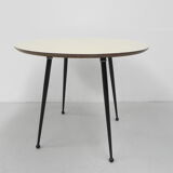 Vintage coffee table with round formica top