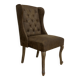 Upholstered armchair in brown imitation leather