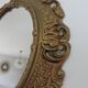 Golden baroque oval mirror, 60s-70s