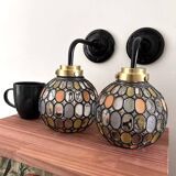Pair of faceted globe wall sconces