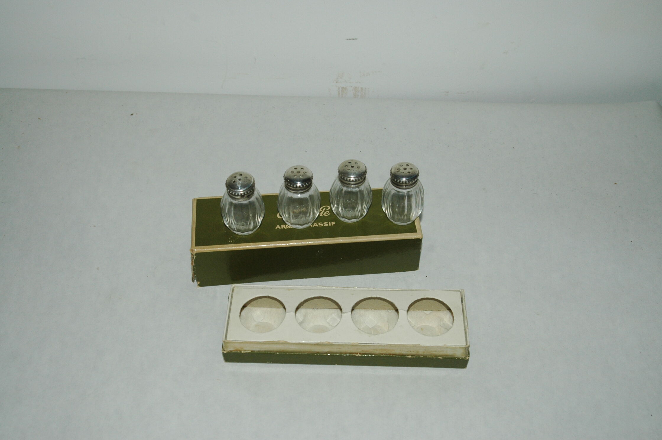 Set of 4 silver salt shakers and Christofle glass