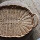Oval wicker tray with two vintage handles