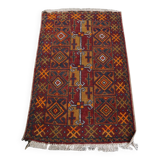 Antique oriental rug featuring orange details 135x81cm