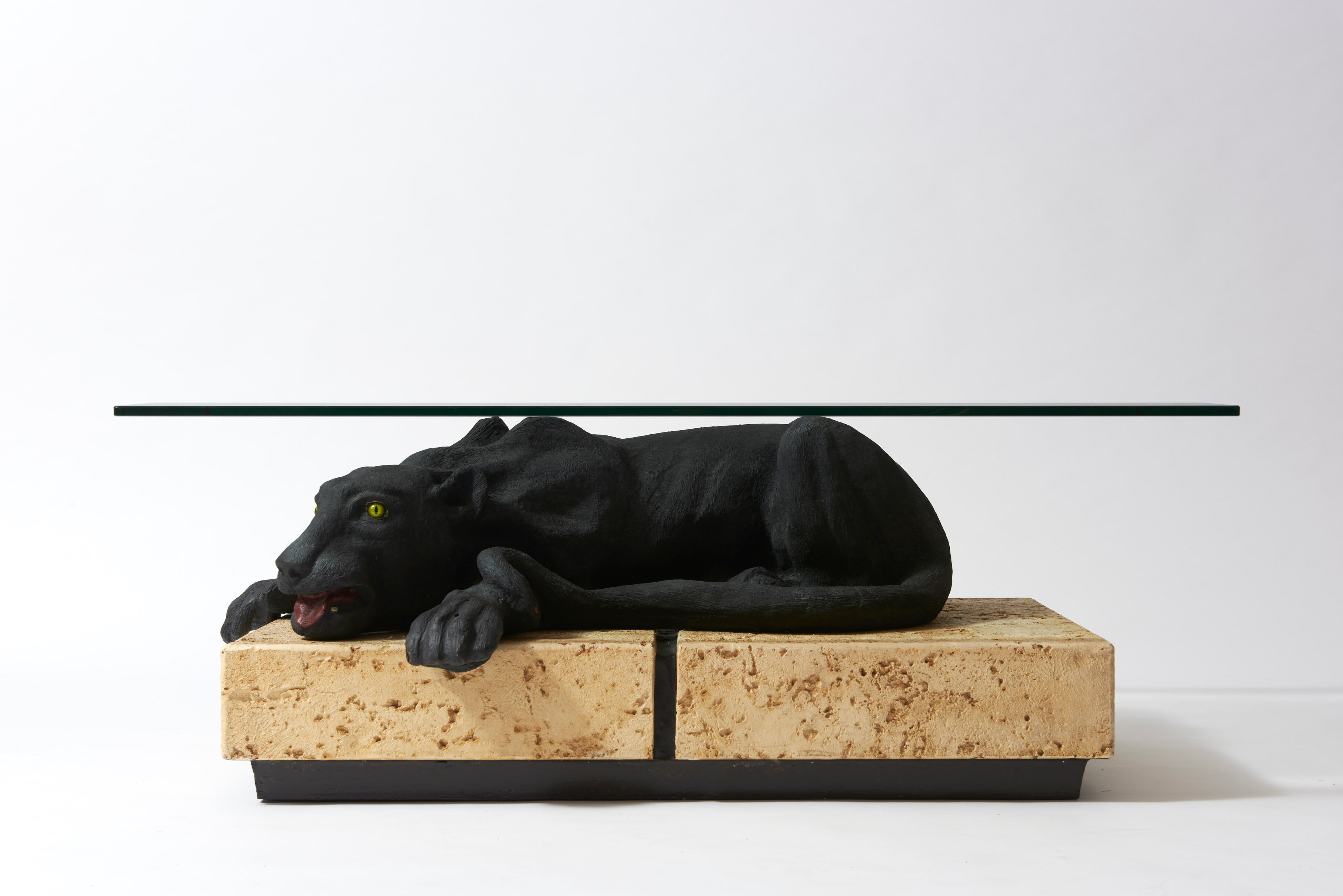 Panther coffee table on stone base and glass tablet