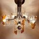 Mid-century chandelier in amber Murano and chrome by Toni Zuccheri for Mazzega, Italy, 1970s.