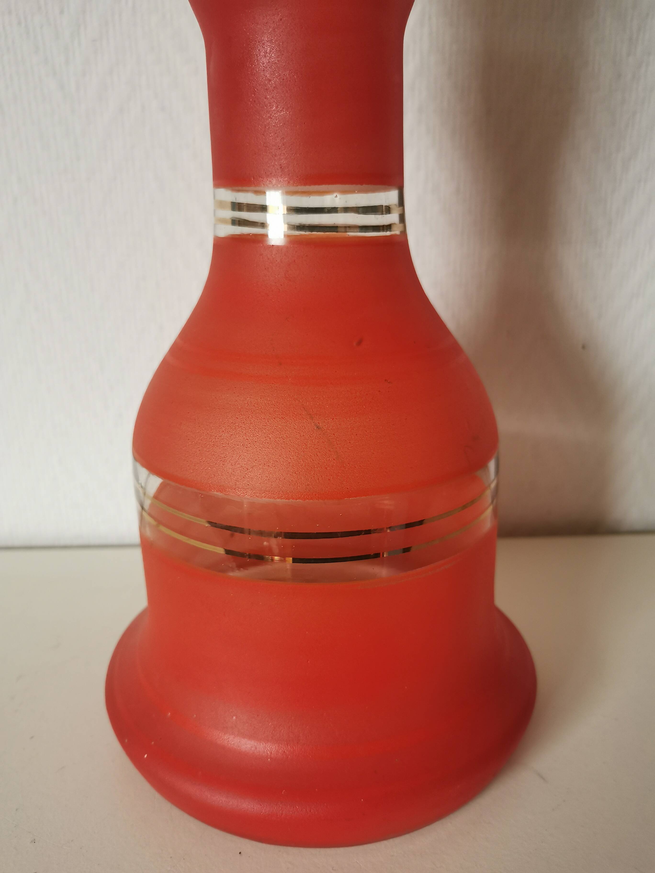 painted glass vase, red and gold granite appearance