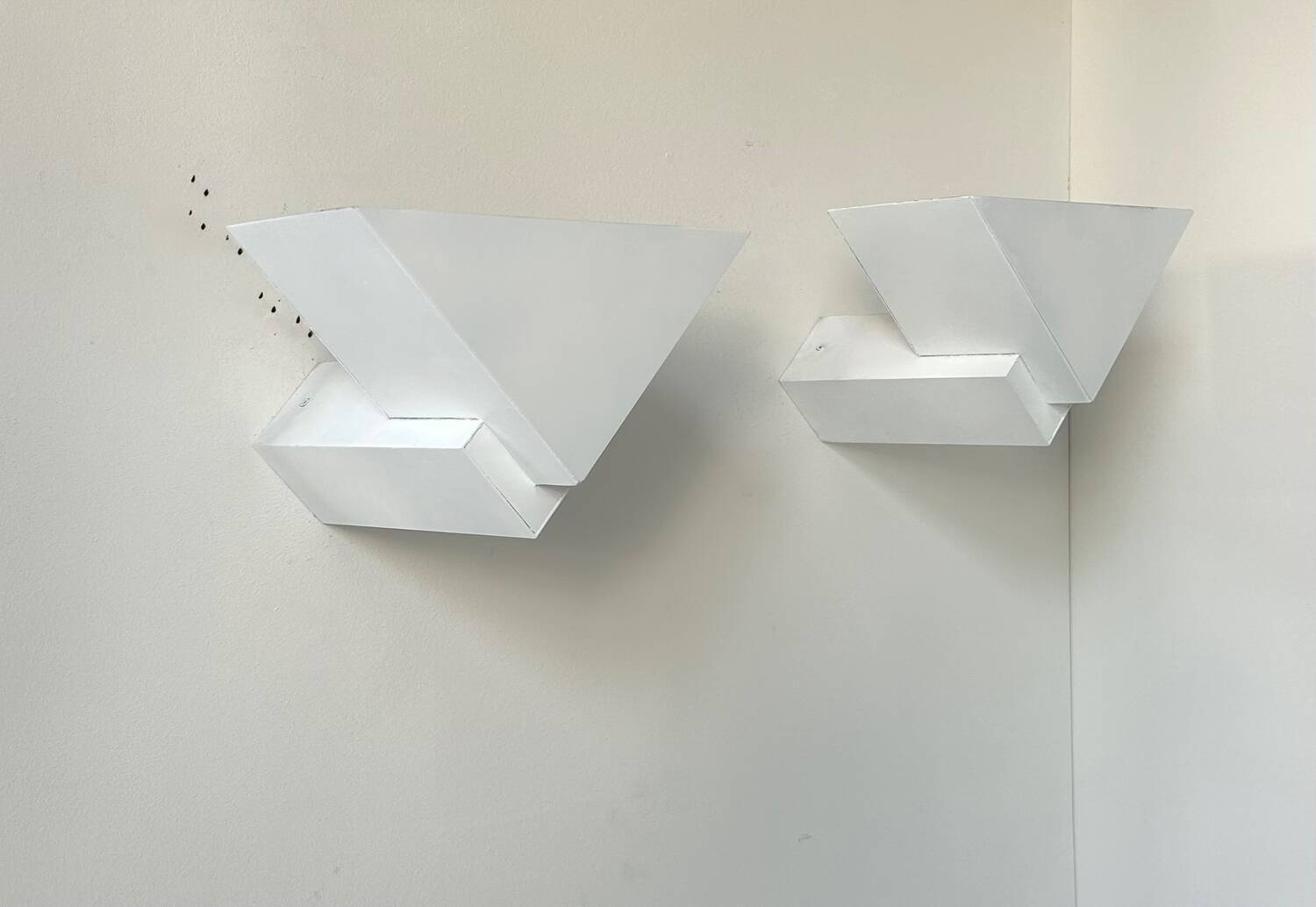 Pair of vintage geometric wall lights, matte white, France 1970