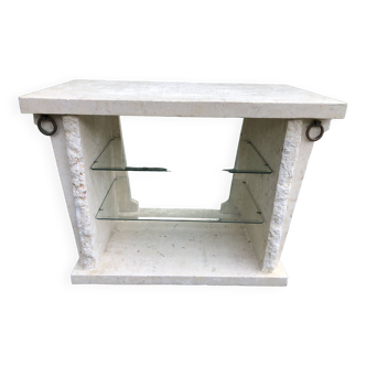 Vintage display console in Mactan travertine stone and plaster with 2 beveled glass shelves.