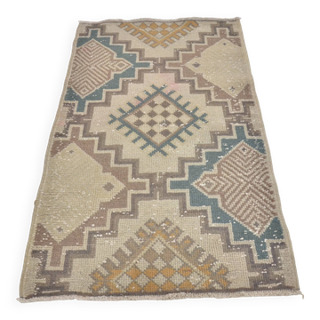Tapis tribal vintage géométrique