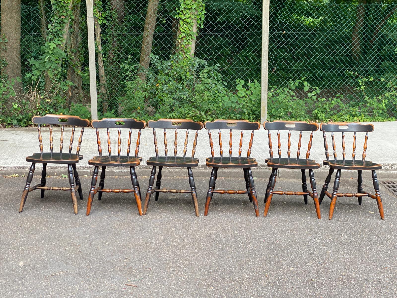 6 solid wood Windsor dining chairs from the 1950s.