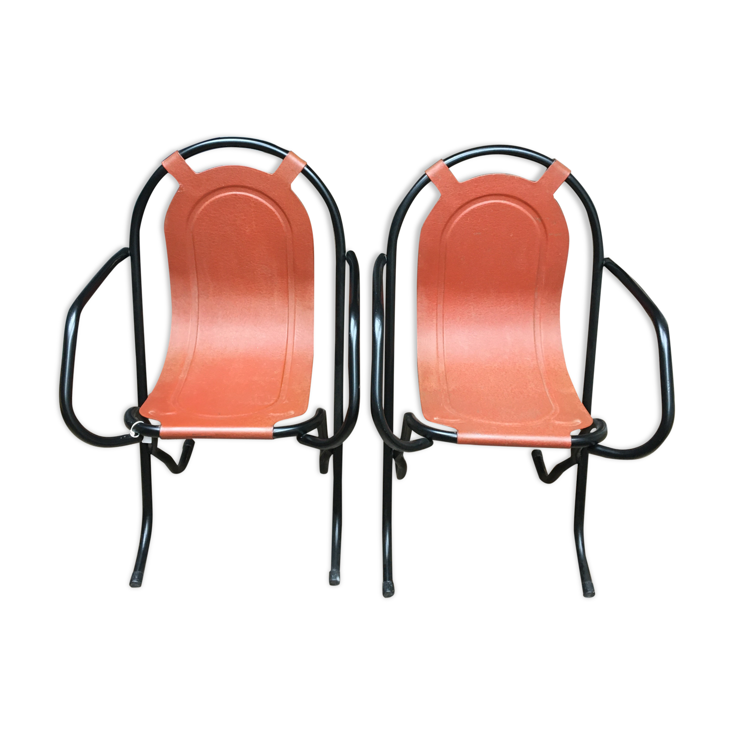 Pair of iron armchairs