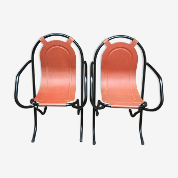 Pair of iron armchairs