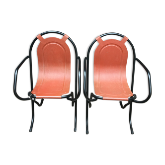 Pair of iron armchairs