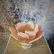 Flower table lamp made of rattan and blush pink linen petals