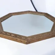 Octagonal mirror in carved wood