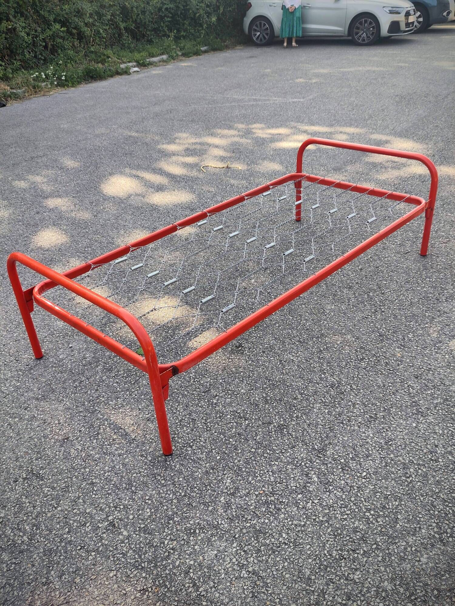 Red metal bed