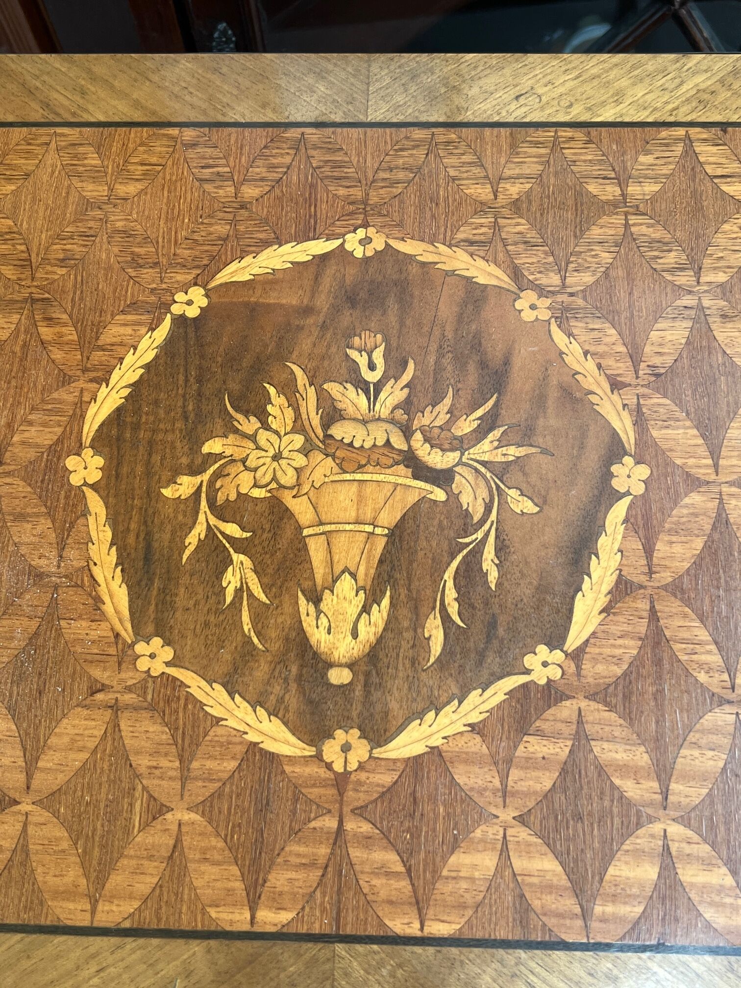 Louis XVI style chest of drawers with marquetry inlay