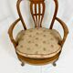Fauteuil bas anglais en bois ajouré à assise cannée, 19e siècle