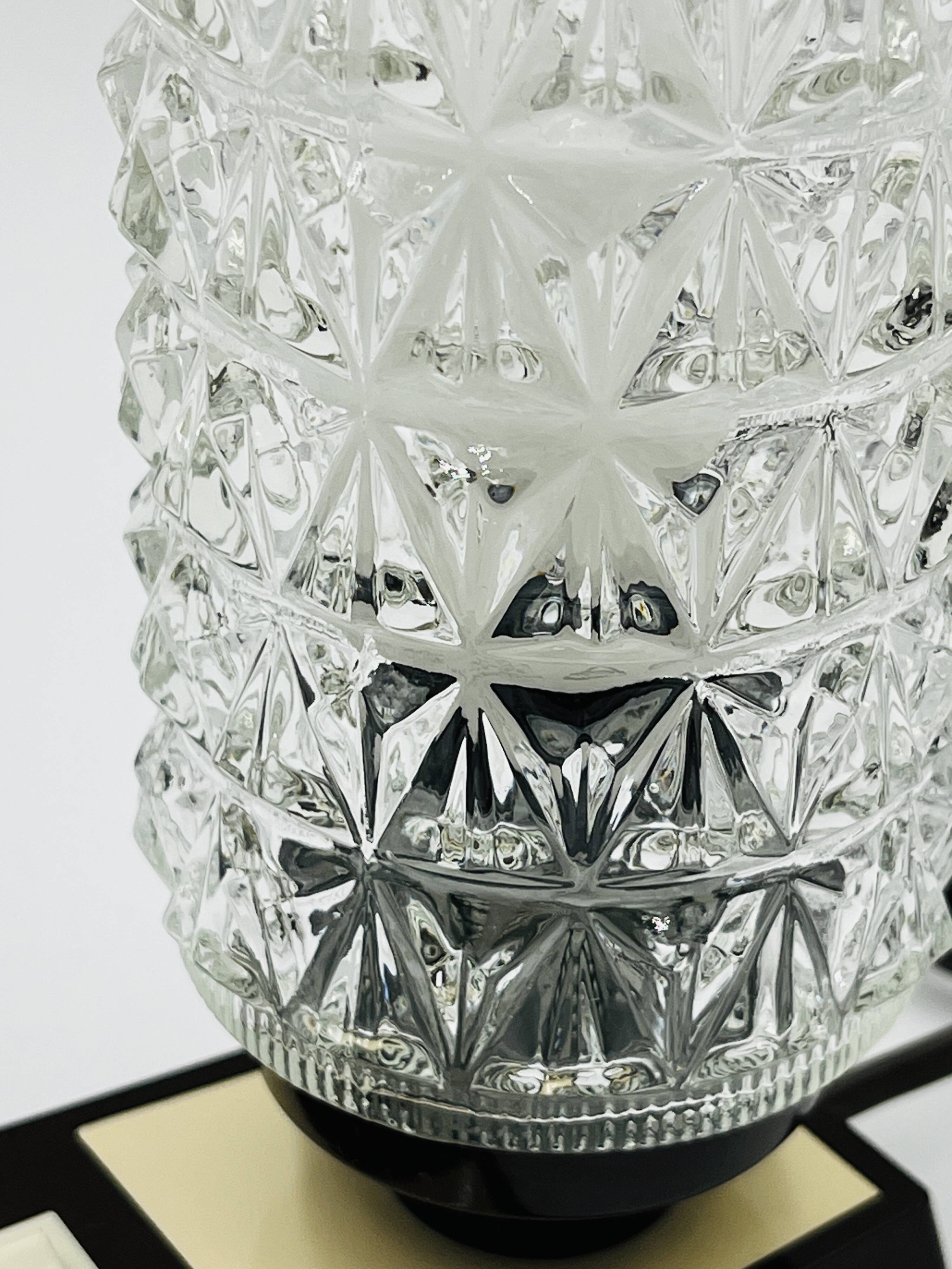 Massive bedside lamp in cut glass