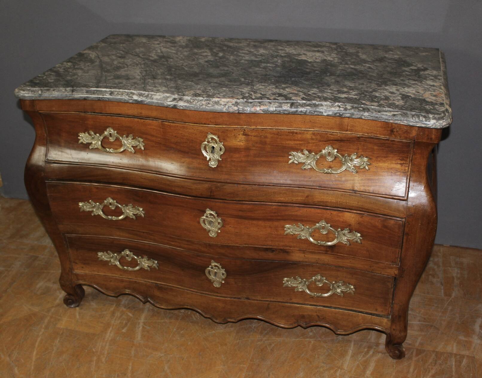 Eighteenth-century walnut tomb commode.