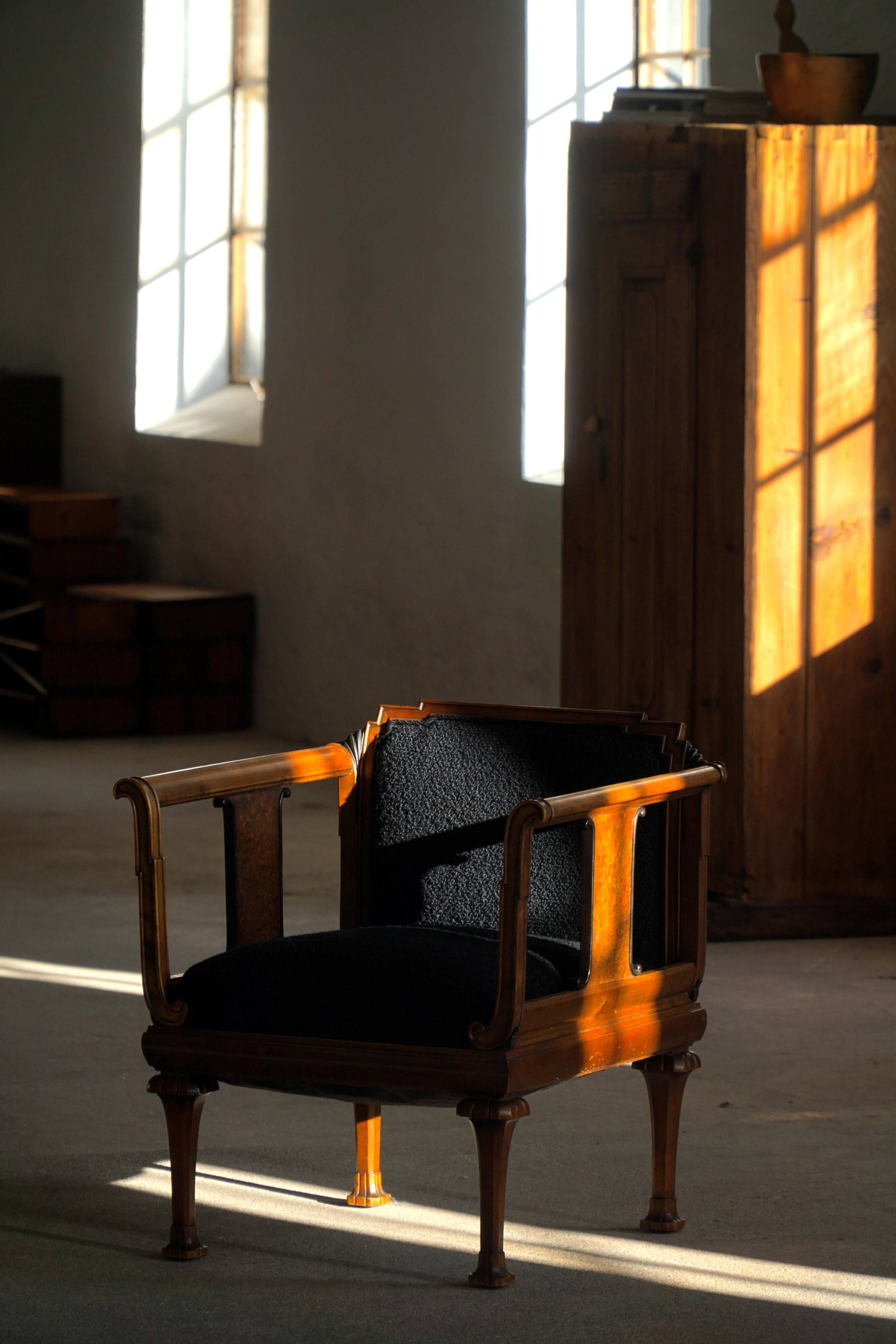 Early 20th century Danish Art Nouveau armchair, reupholstered in charcoal boucle.