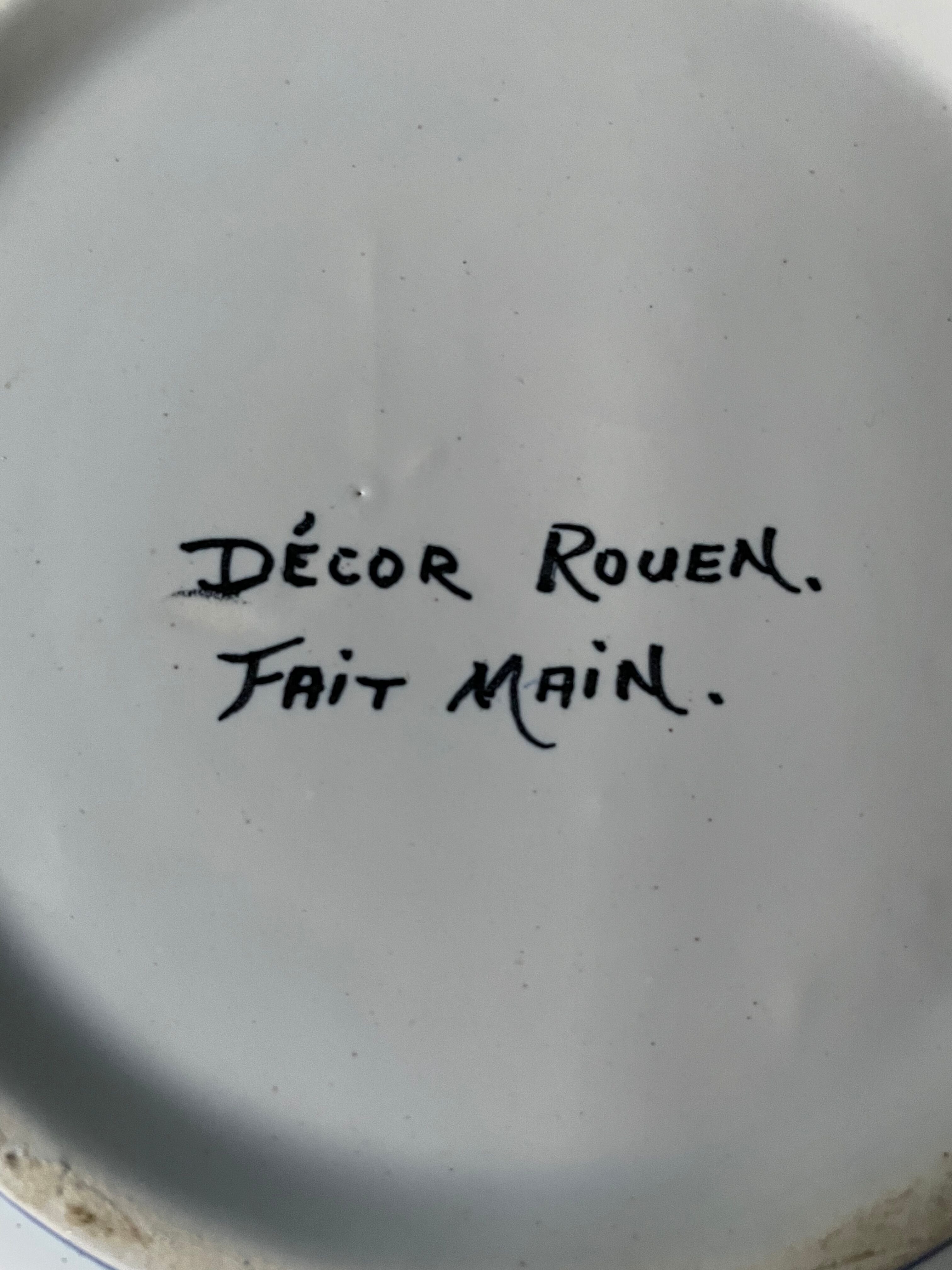 Hollow round dish in Rouen earthenware