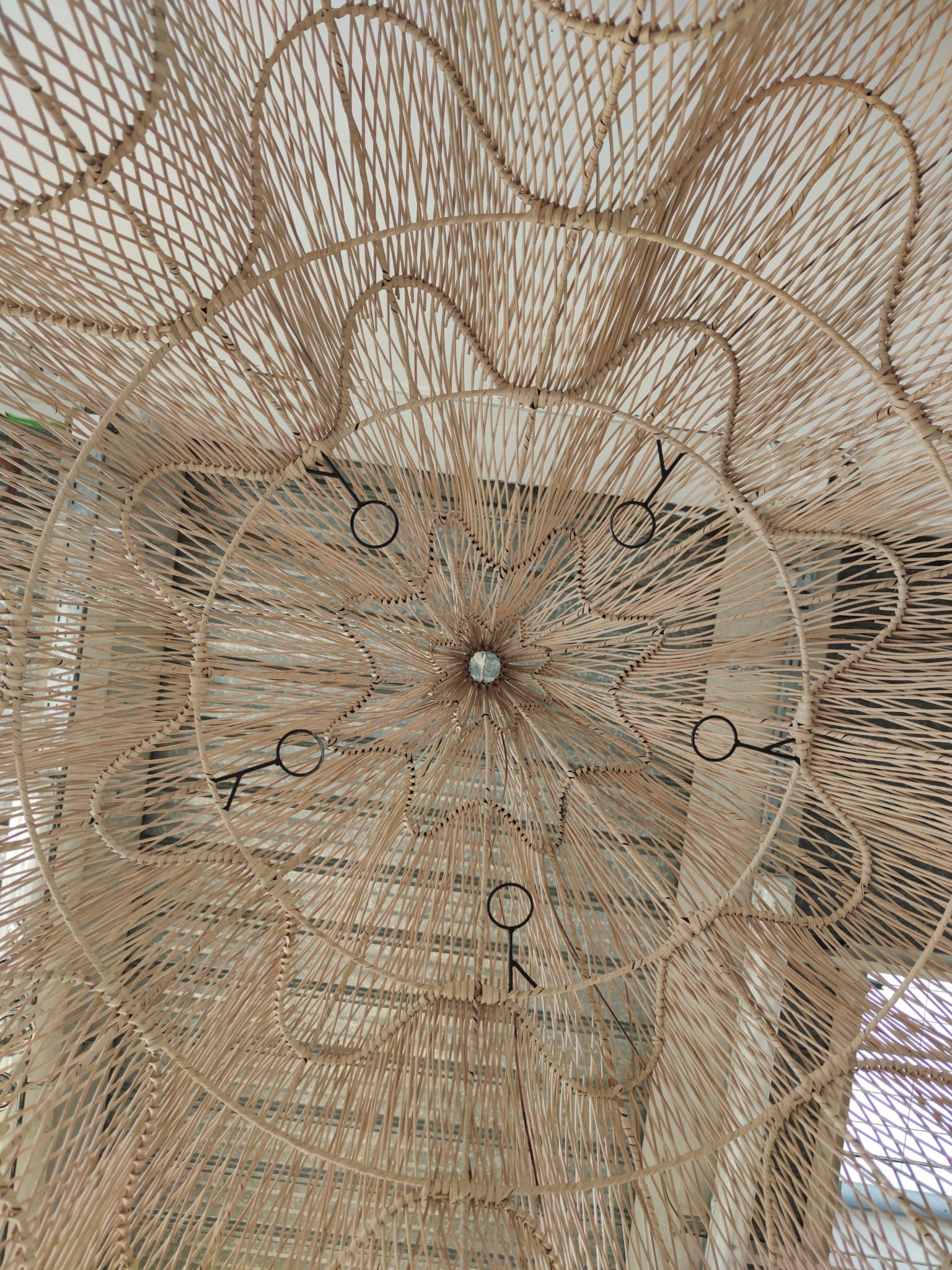 Huge rattan suspension in the shape of a corolla H:1m; D: 1m50