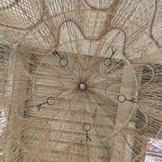 Huge rattan suspension in the shape of a corolla H:1m; D: 1m50