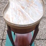 Louis XVI period pedestal table, in solid mahogany and veneer, and in gilded bronze.