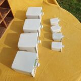 Vintage wooden spice rack with ceramic drawers