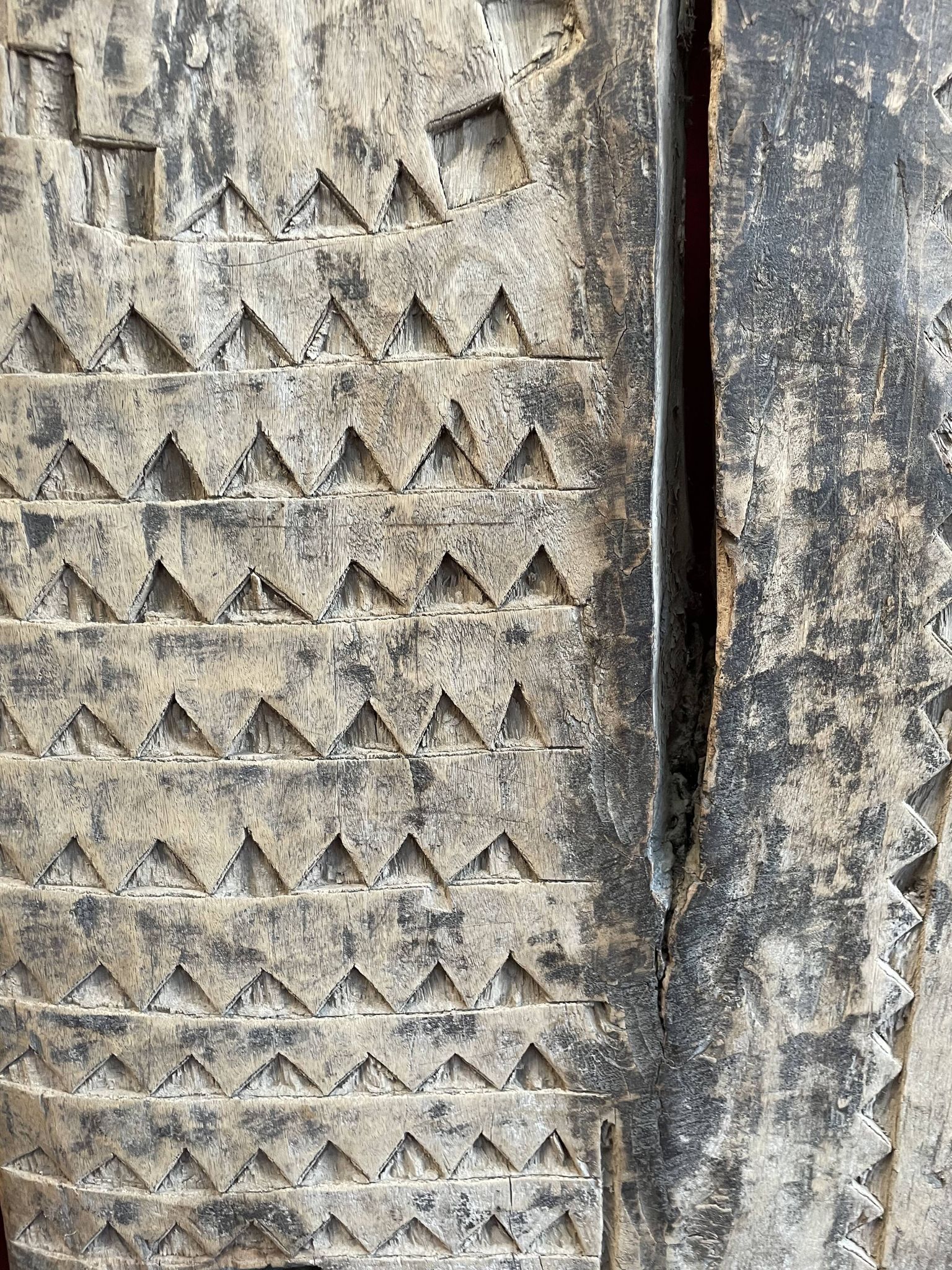 Ancient eroded wooden Tsonga Gate from the late nineteenth century, from the KwaZulu/Natal region