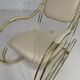 60s rocking chair in brass and ecru faux leather