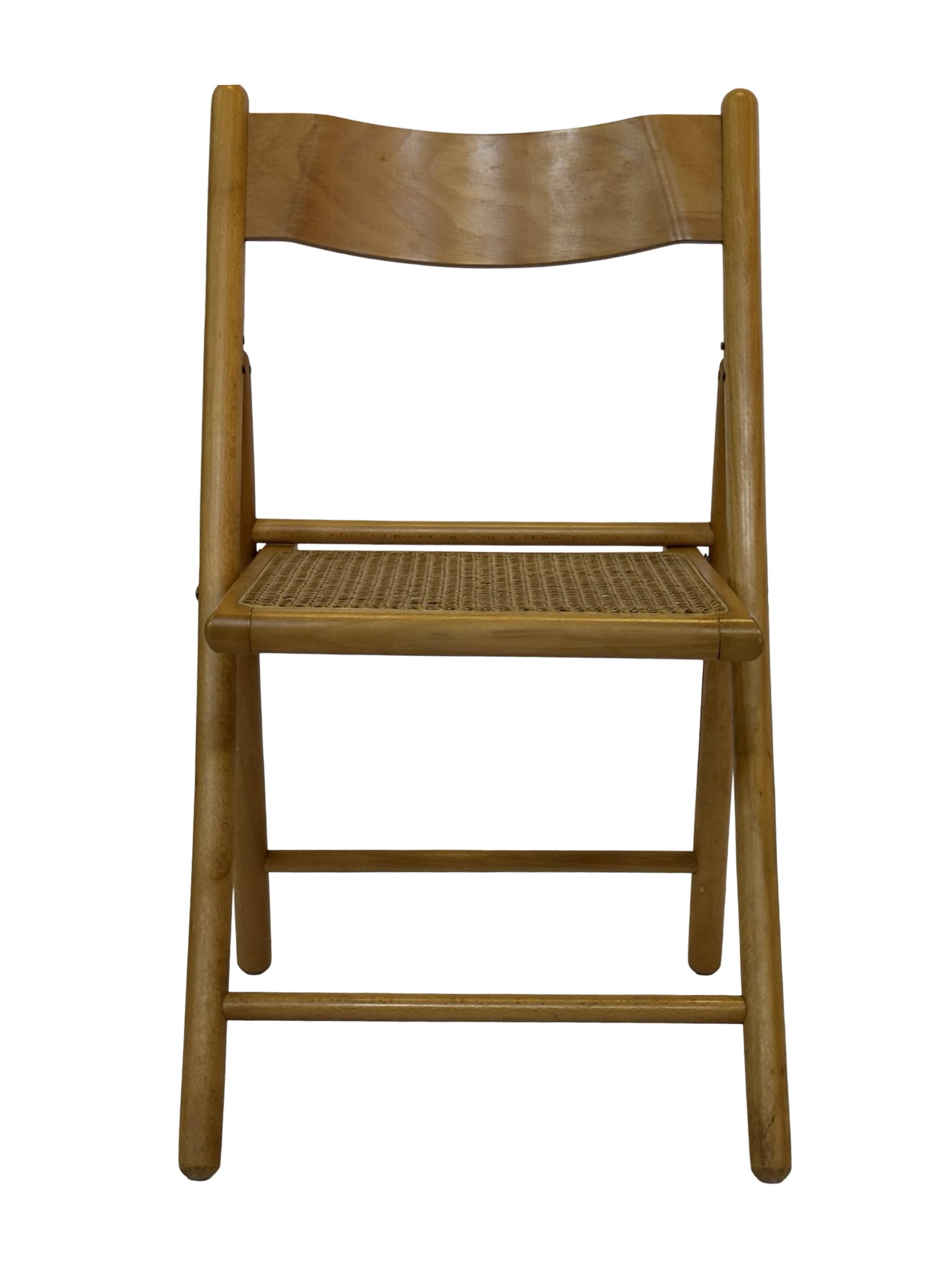 Vintage wooden folding chair with rattan seat 80s minimalist design
