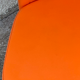 Chauffeuse vintage orange skaï et chrome 1970