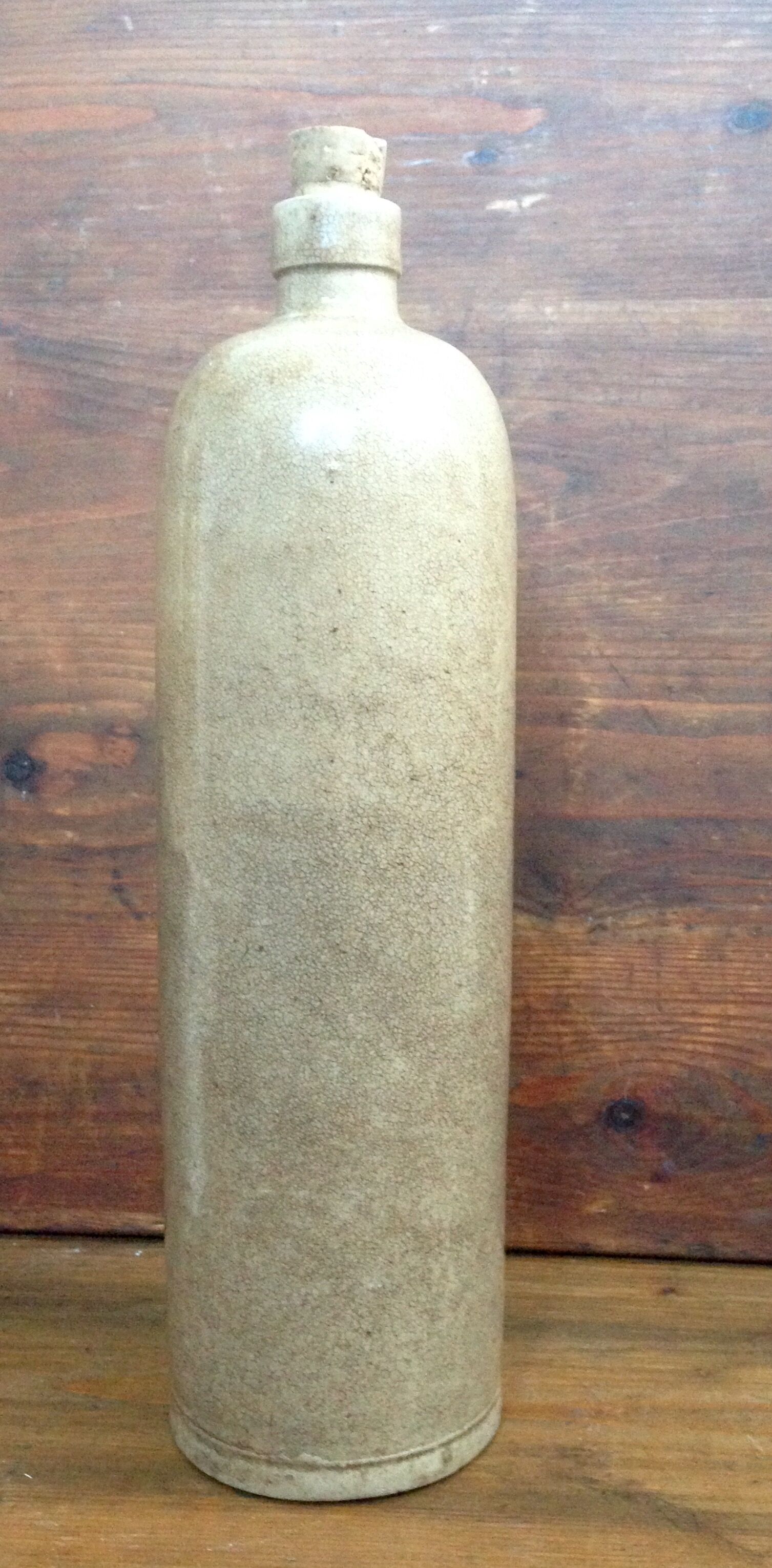 Enamelled stoneware bottle