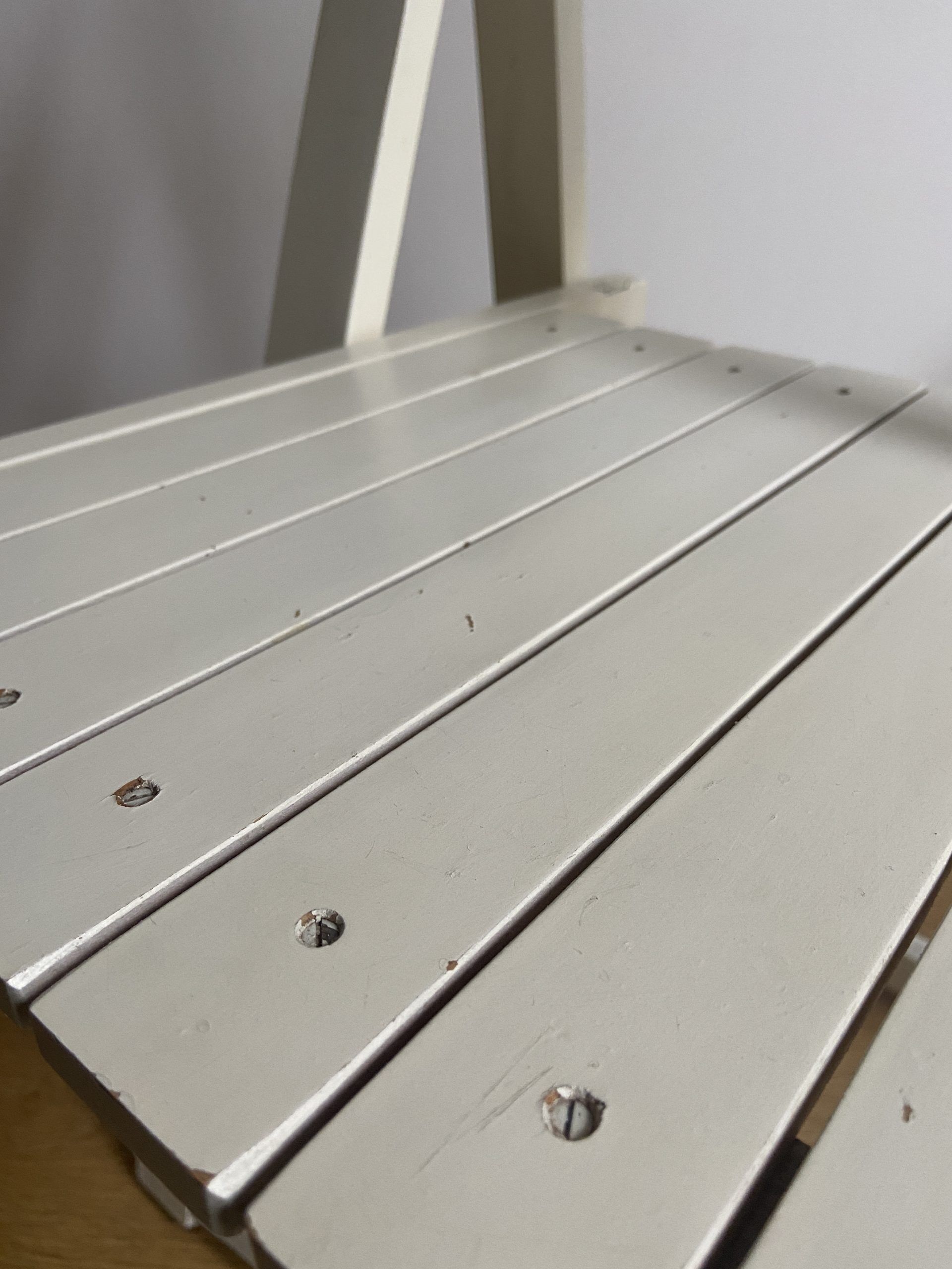 White folding vintage chair