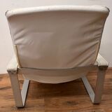 Pulkka armchair by Ilmaria Lappalainen and its ottoman