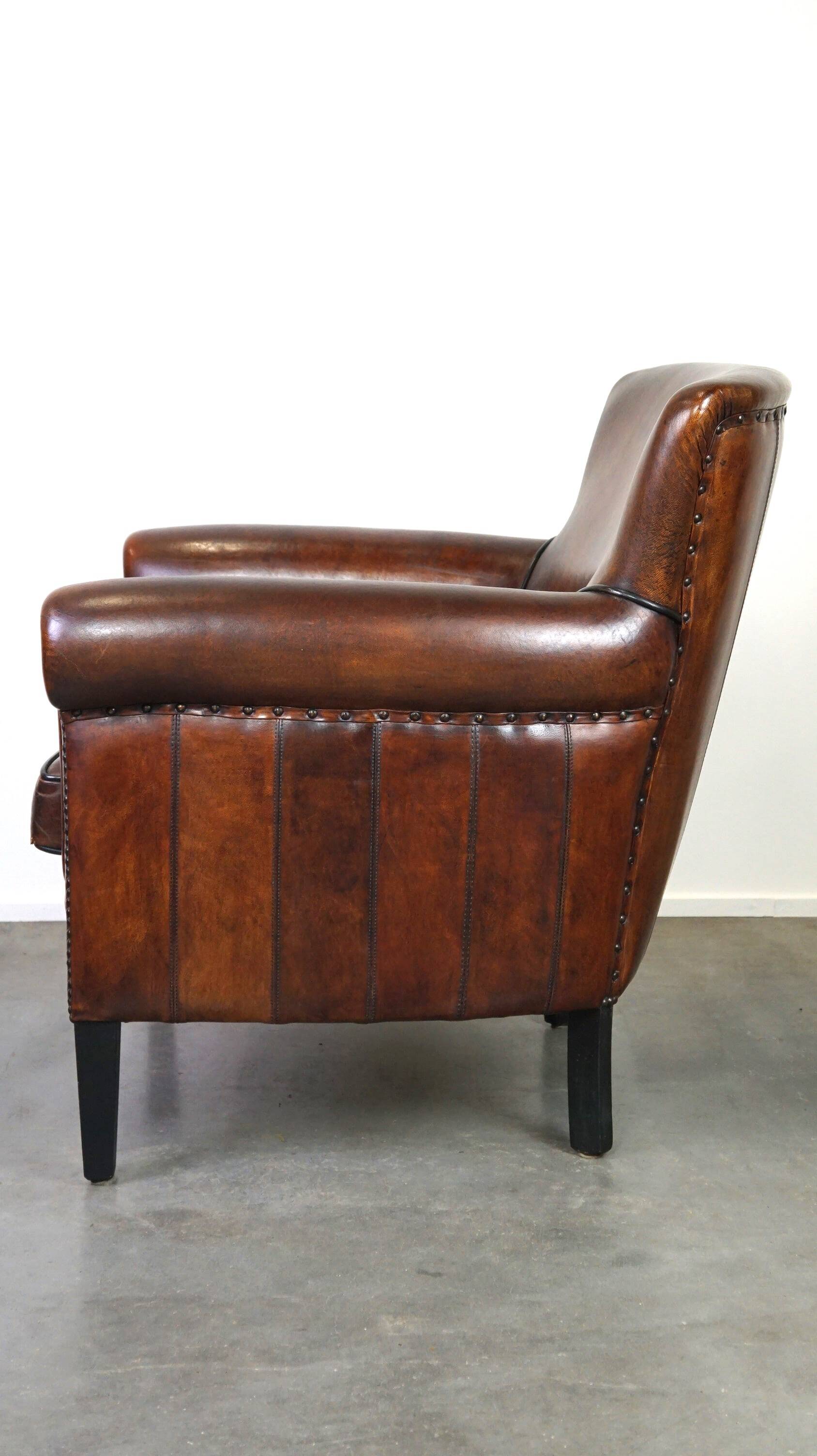 Stylish sheepskin leather armchair with a refined appearance