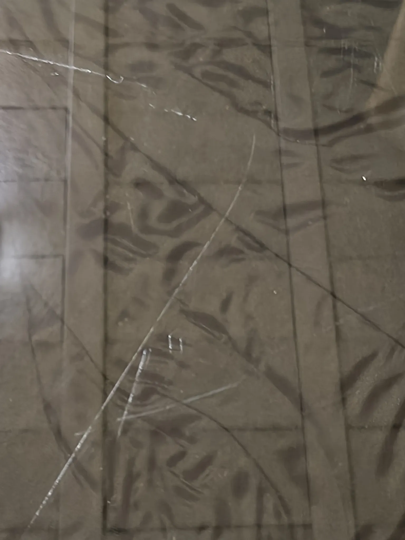 Smoked glass octagonal table from the early 1970s.