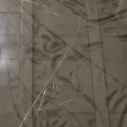 Smoked glass octagonal table from the early 1970s.