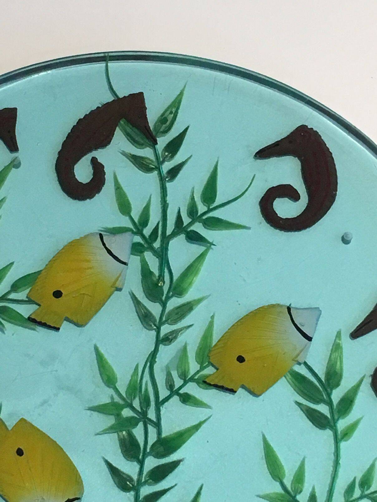 Set of 4 resin trays, inlaid with seahorses, fish, seaweed, and shells.