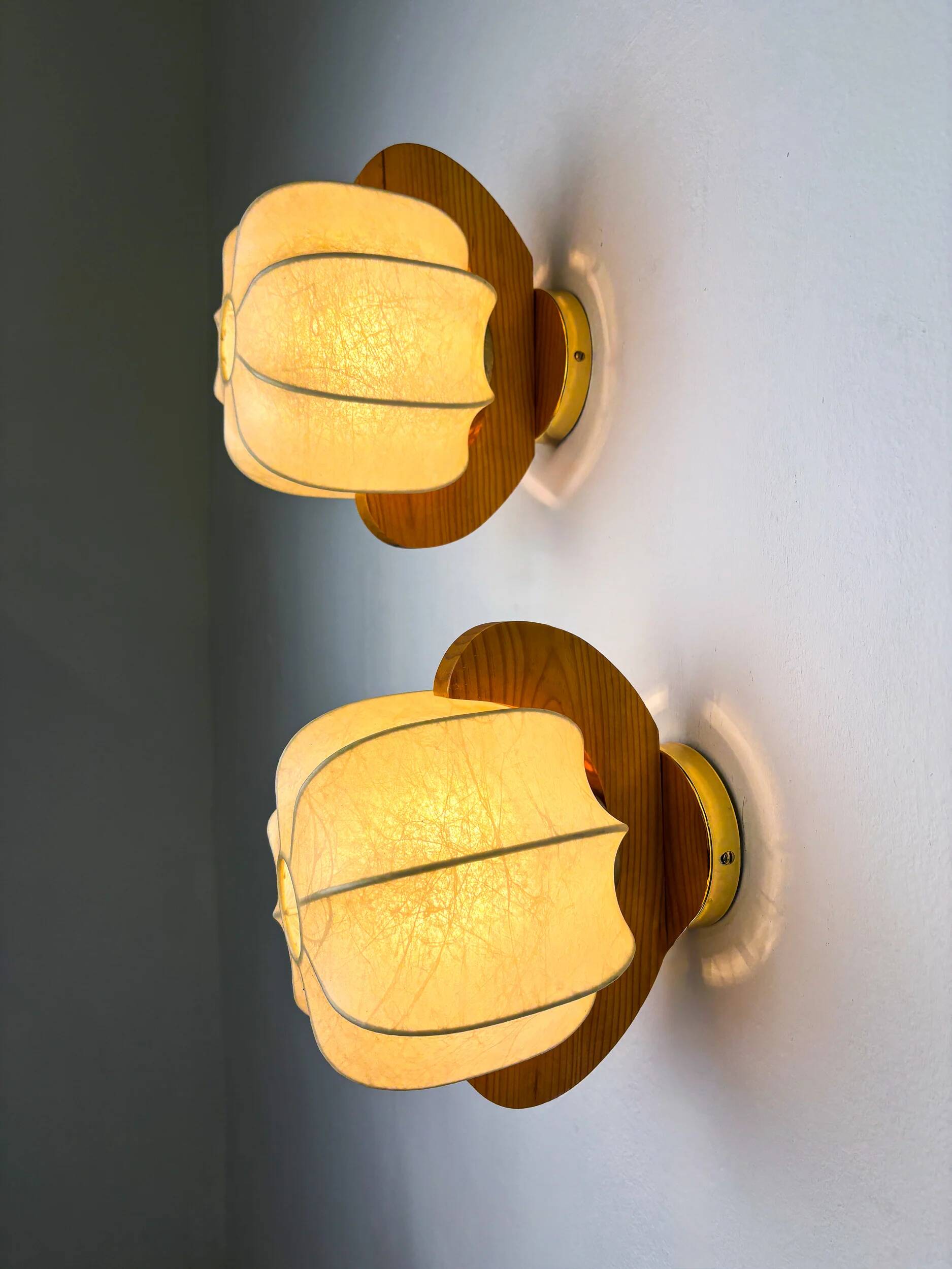 Pair of cocoon sconces with pine, Italy, 1970s