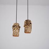 Sculptural ceramic pendant lamps by Bodil Marie Nielsen