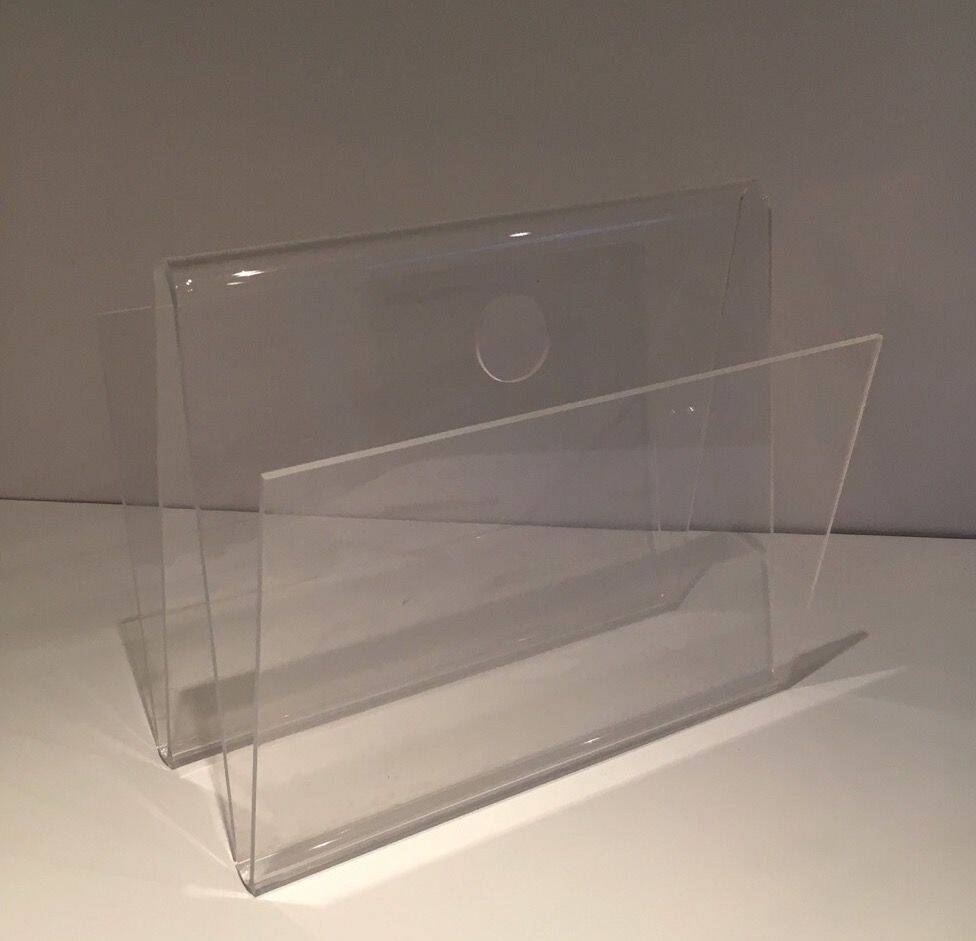 Acrylic magazine rack. Circa 1970.