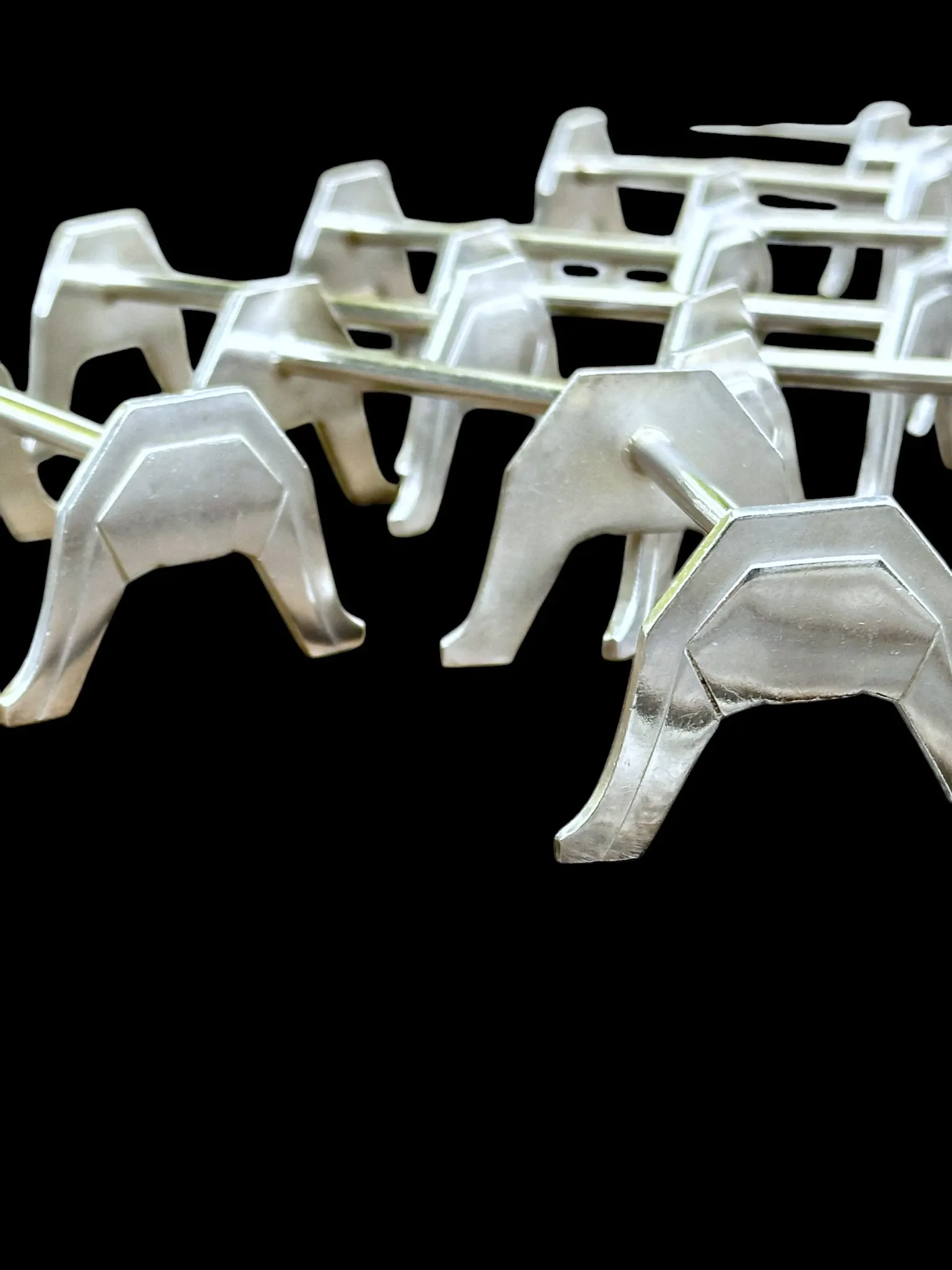 12 silver-plated metal knife rests by the silversmith Saglier, Arceaux Art Deco model.