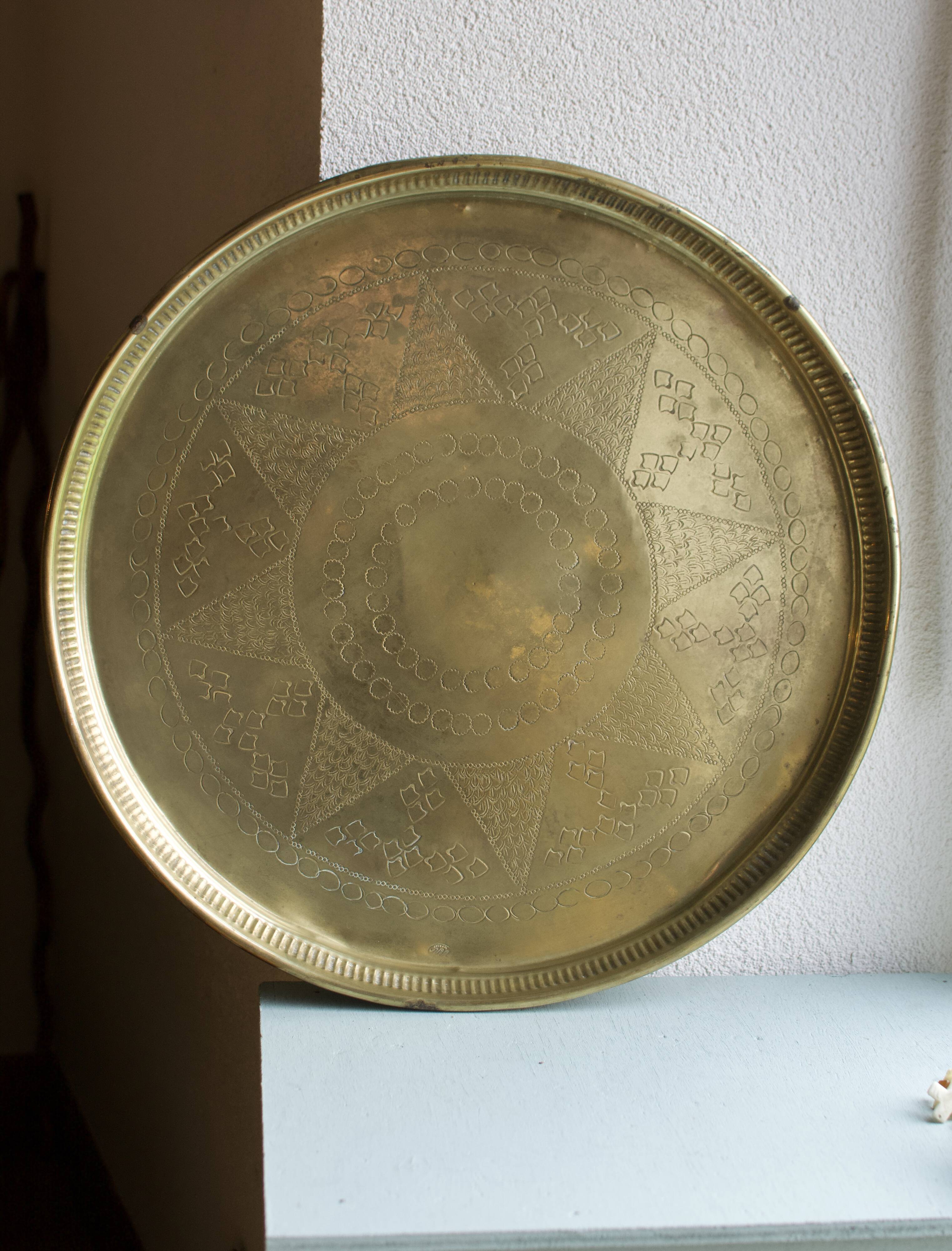 Golden service tray in vintage brass